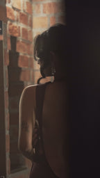 Twilight Wine Eclipse Gown video — handcrafted pure silk satin evening gown with fluid movement. Luxury womenswear by Malang Studios.